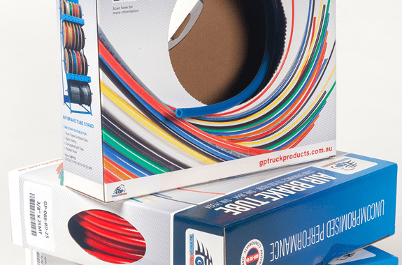 tube boxes stacked top box open showing tube